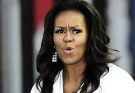 Michelle Obama with pursed lips and furrowed brow, wearing a white shirt and dangling