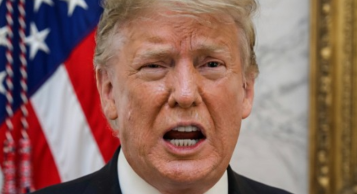 Donald Trump standing quietly in Washington, D.C.