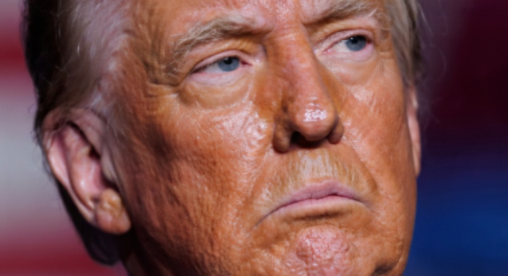 Donald Trump speaking amid legal charges