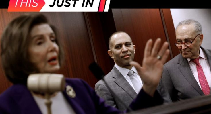 Nancy Pelosi speaking at a podium with a gavel, with Hakeem Jeffries and Chuck Schumer