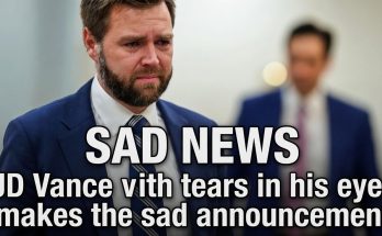 JD Vance crying with tears streaming down his face, wearing a blue suit and striped tie