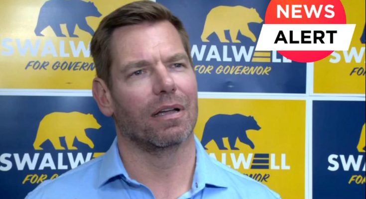 Eric Swalwell speaking in front of campaign signs with a bear logo, with a news alert