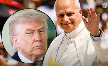 A man in white papal attire waves with his right hand while a circular inset shows