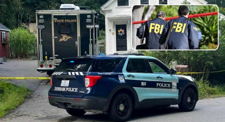 Police vehicles including a Durham Police SUV and State Police truck parked near a house