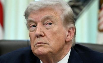 Close-up of Donald Trump looking to the side with a serious expression