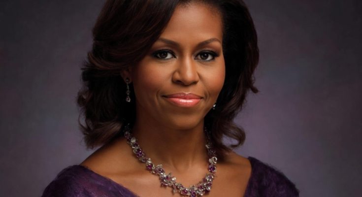 Portrait of Michelle Obama wearing a purple dress and ornate necklace with matching