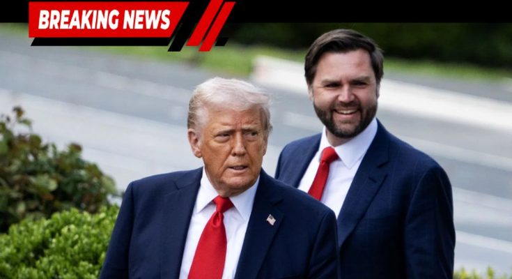 Donald Trump and J.D. Vance standing outdoors, both wearing dark suits with red ties