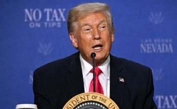 donald Trump speaking at podium with presidential seal, blue backdrop reading NO TAX ON