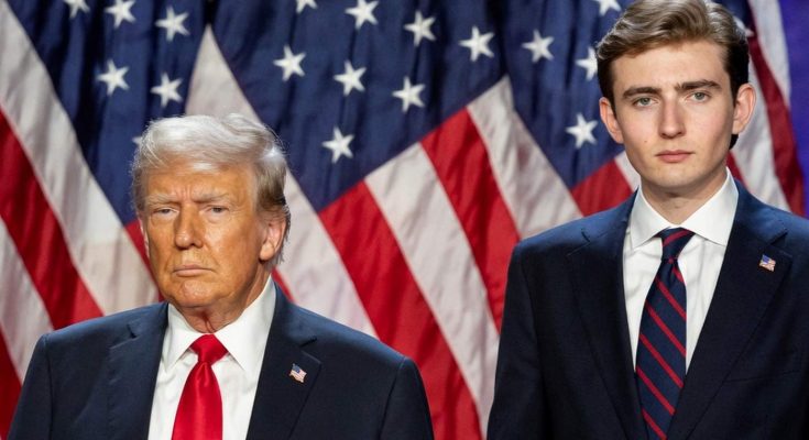 two men in suits with American flag backdrop, serious expressions