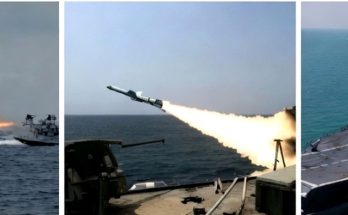 warships in formation on ocean with missile launch focus