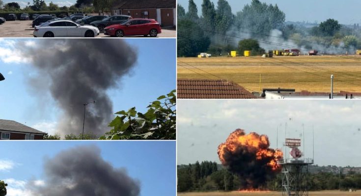 smoke and explosion at airfield with emergency response vehicles