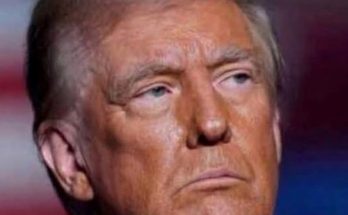 donald Trump with serious expression and Breaking News text overlay on patriotic