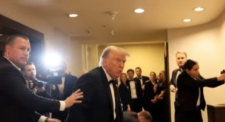 security team escorts man in tuxedo during high-profile event