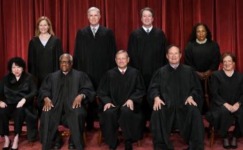 tmph6k82aqr speaking in a news photo