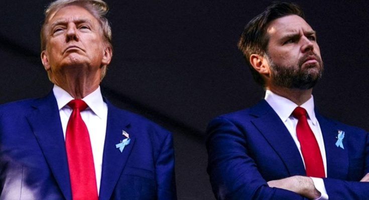 donald Trump and JD Vance stand side by side in matching navy suits, red ties, and blue