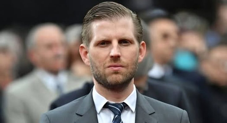 confident businessman in formal suit at public event