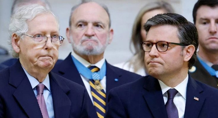 mitch McConnell and Speaker Mike Johnson stand together at a formal event with Medal of