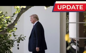 Donald Trump walking outside the White House in a dark suit, with an UPDATE banner and