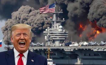 political leader in front of burning aircraft carrier with smoke