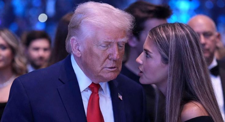 l8BXLF speaking in a news photo