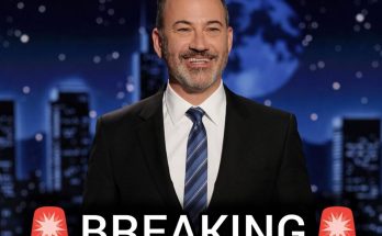 smiling host on nighttime set with breaking news headline