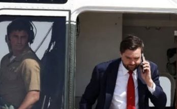 news figure speaking in a news photo