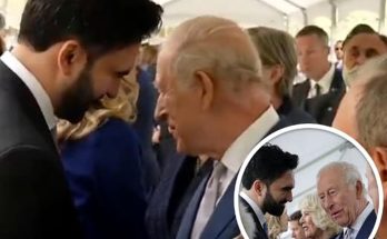 news figure speaking in a news photo