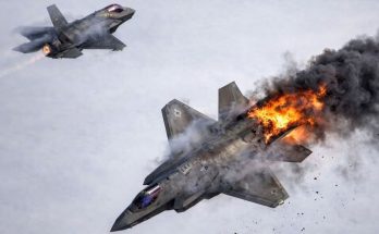 military jet in flames during aerial combat exercise