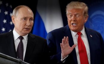 news figure speaking in a news photo