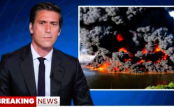 news anchor reports on massive fire with dark smoke