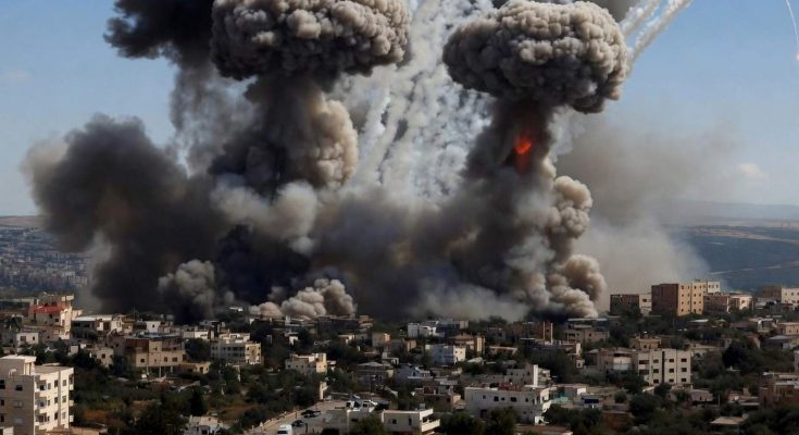 large explosions with smoke over city buildings under blue sky