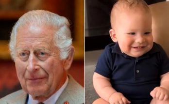 royal family members in formal attire and smiling baby