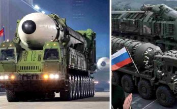military parade with missile launchers and helicopters in formation