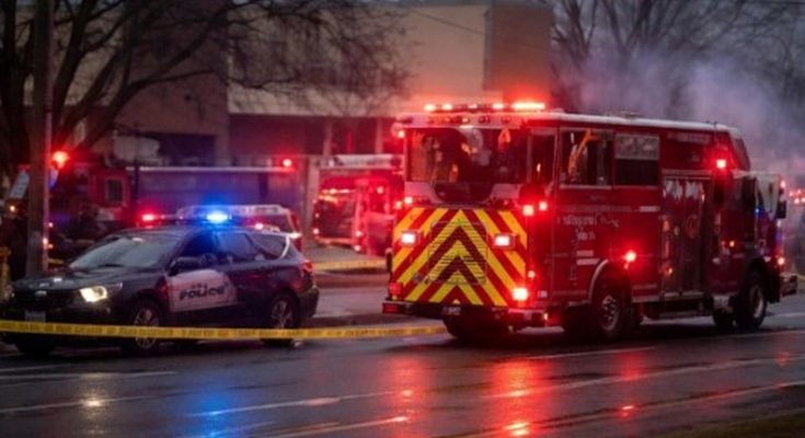 emergency vehicles respond to Madison school shooting scene