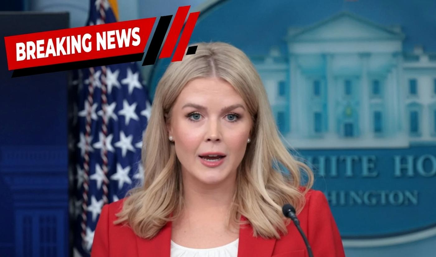 woman in red blazer speaks at White House press briefing