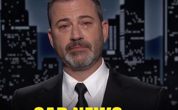 man in suit with tears in eyes against cityscape backdrop