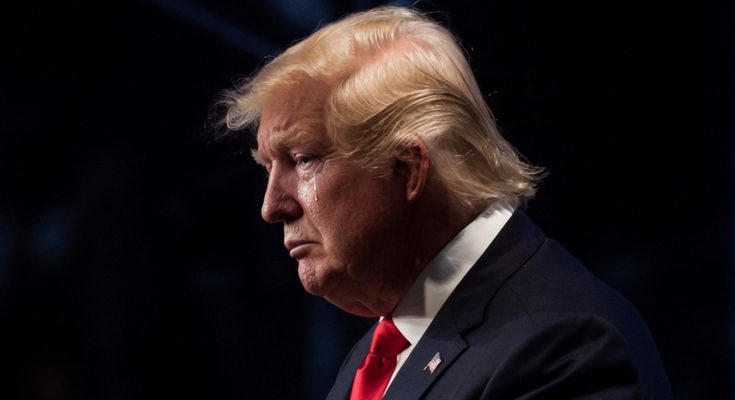 donald Trump in profile, displaying a contemplative expression