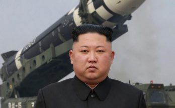 news figure speaking in a news photo