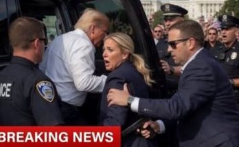 news figure speaking in a news photo
