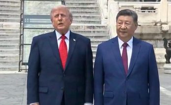 news figure speaking in a news photo